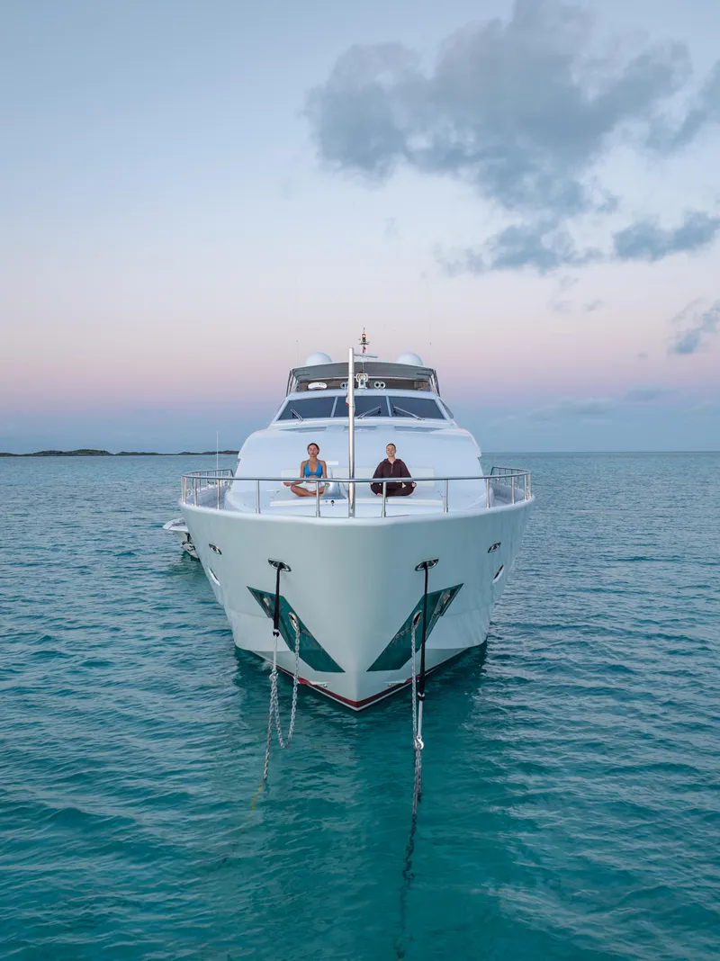 Slide: The Image of 2004 Ferretti Yachts 112 Custom Line on serene ocean at sunset. - 8