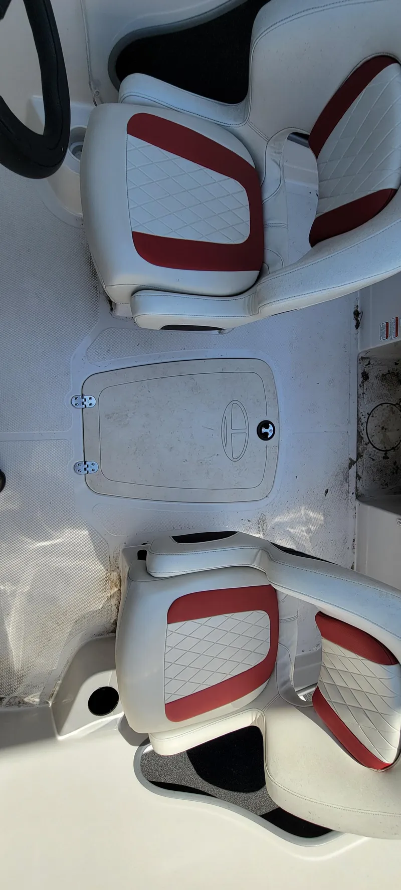 Slide: The Image of 2016 Tahoe 450 TF boat interior with white and red seating. - 26