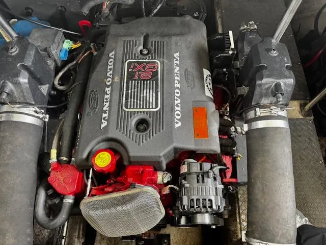 Slide: The Image of Volvo Penta engine in 2004 Regal Commodore 4260 boat, showcasing mechanical components. - 26