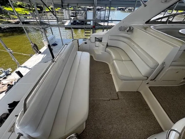 Slide: The Image of 2004 Regal Commodore 4260 yacht interior with spacious seating and elegant design. - 29