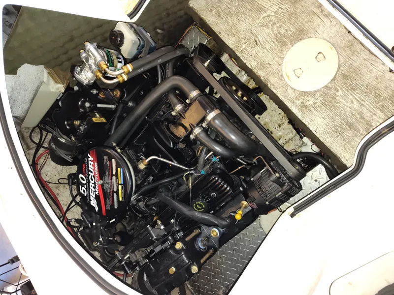 Slide: The Image of Engine compartment of a 2001 Hurricane 201GS with a 5.0 Mercury motor. - 7