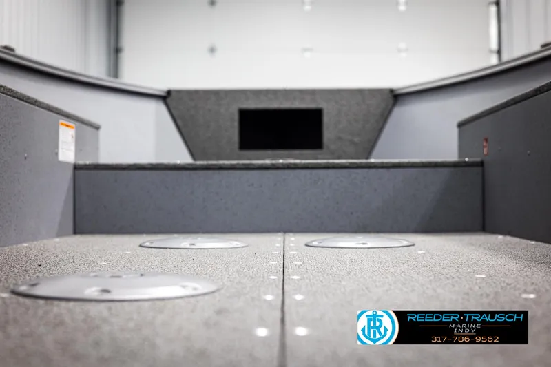 Slide: The Image of 2025 Lund 1600 Fury Heritage Edition boat interior, featuring a spacious deck. - 28