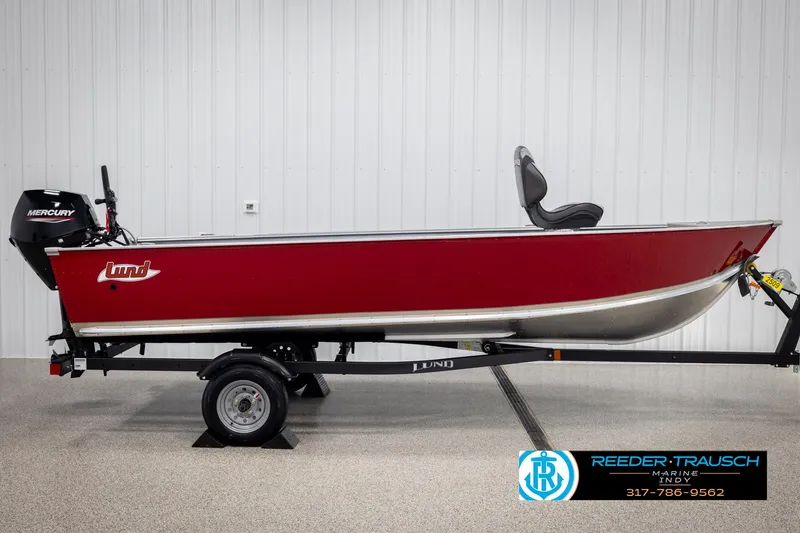 Slide: The Image of 2025 Lund 1600 Fury Heritage Edition boat in red on trailer, side view. - 3