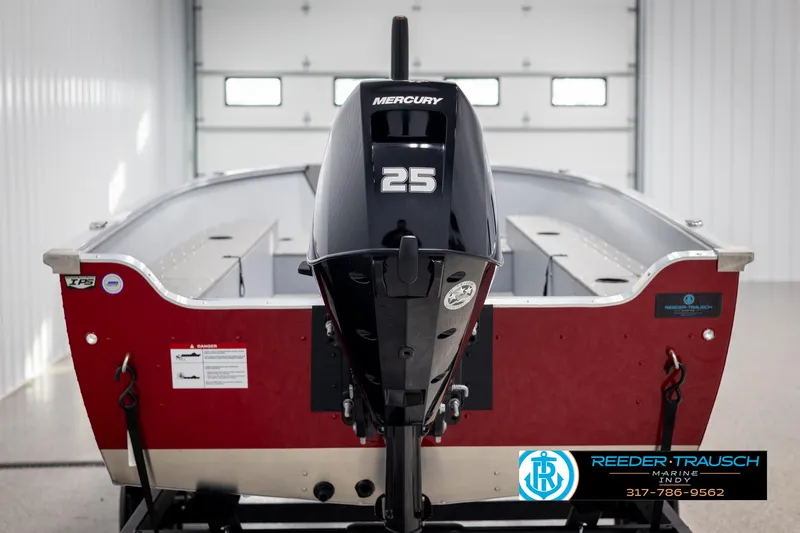 Slide: The Image of 2025 Lund 1600 Fury Heritage Edition boat with Mercury 25 engine in showroom. - 5