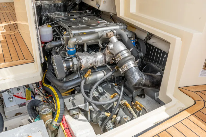 Slide: The Image of Engine compartment of 2018 Hinckley Picnic Boat MKII, showcasing detailed mechanical components. - 20