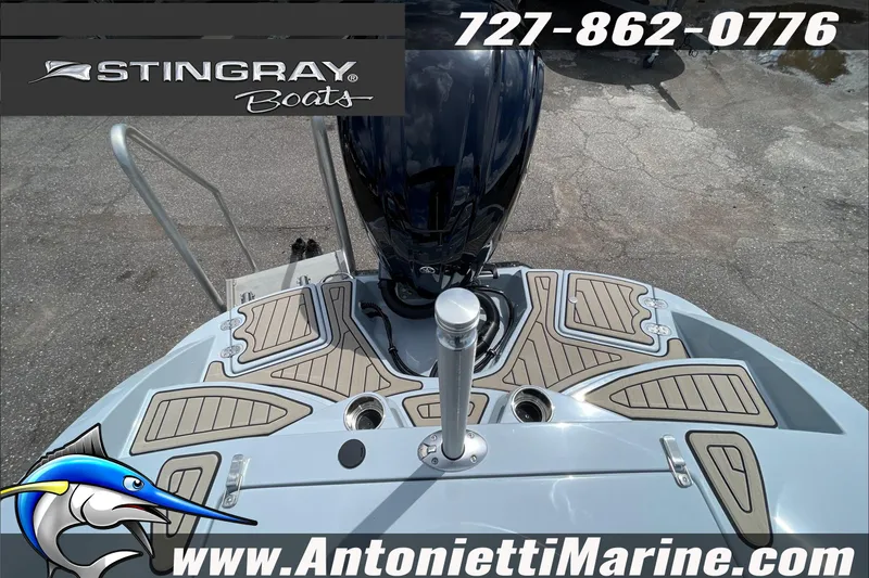 Slide: The Image of 2026 Stingray 23 OSX boat deck with logo and contact details for Antonietti Marine. - 11