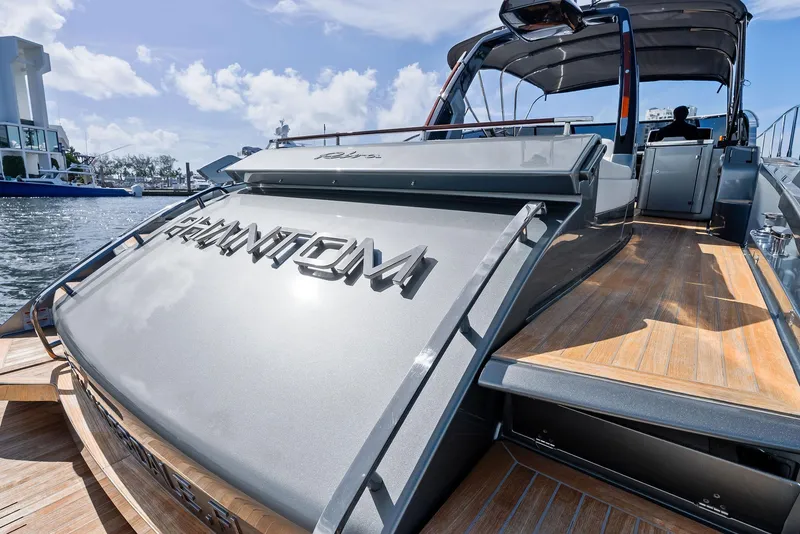 Slide: The Image of Luxurious cockpit of 2019 Riva 56 Rivale yacht with white leather seating. - 19