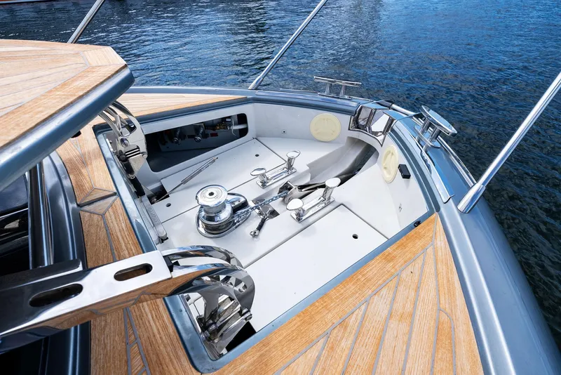 Slide: The Image of Interior of Riva 56' Rivale yacht, luxurious cabin with wood furnishings, 2019. - 44