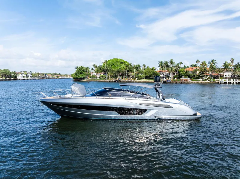 Slide: The Image of Luxury 2019 Riva 56 Rivale yacht cruising on a sunny day. - 6