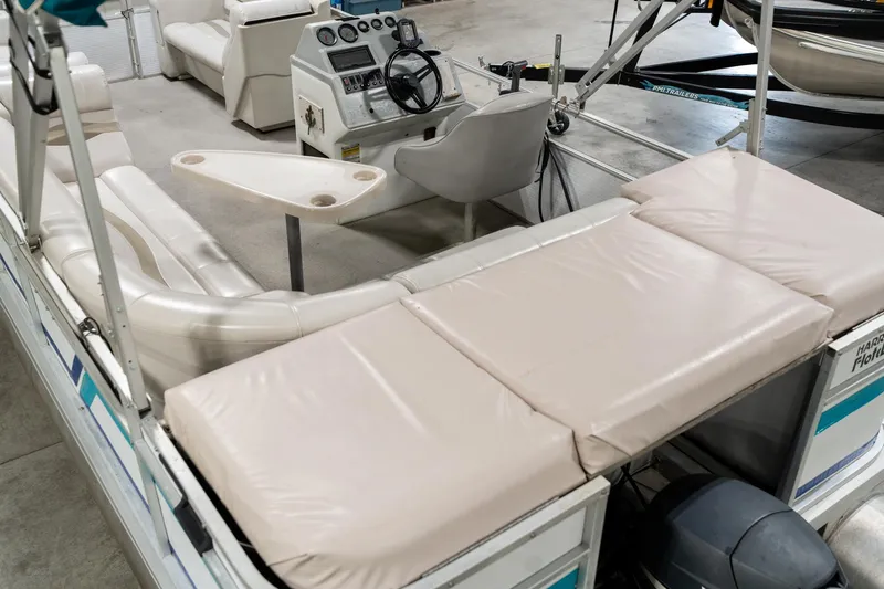 Slide: The Image of 1992 Harris FloteBote 240 Super Sunliner interior with seating and control panel. - 14