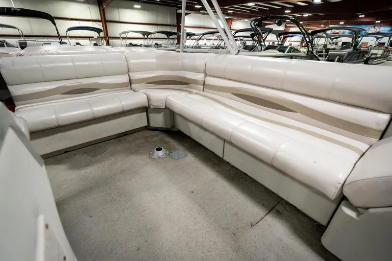 Slide: The Image of 1992 Harris FloteBote 240 Super Sunliner interior with white cushioned seating. - 26