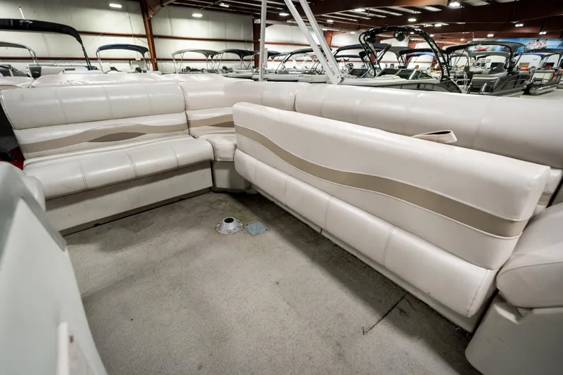 Slide: The Image of Interior of 1992 Harris FloteBote 240 Super Sunliner with white seating in showroom. - 29