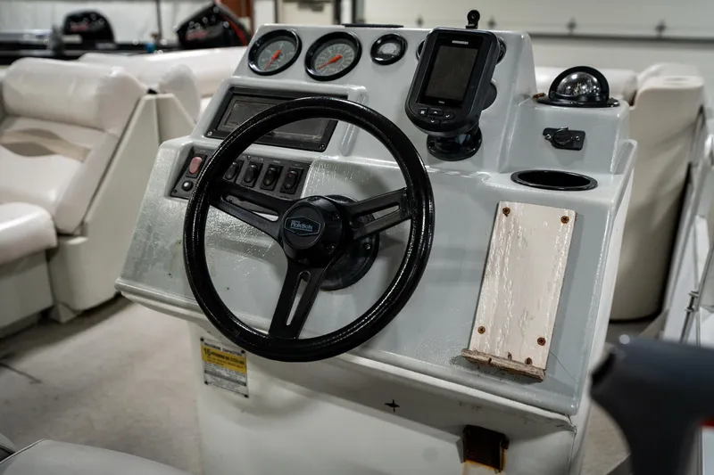 Slide: The Image of Steering console of a 1992 Harris FloteBote 240 Super Sunliner pontoon boat. - 30