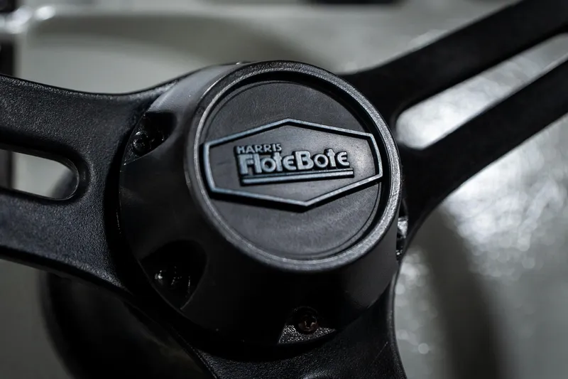 Slide: The Image of Close-up of Harris FloteBote 240 Super Sunliner 1992 steering wheel emblem. - 32