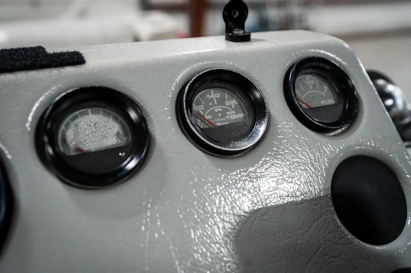 Slide: The Image of Dashboard gauges of a 1992 Harris FloteBote 240 Super Sunliner boat. - 35