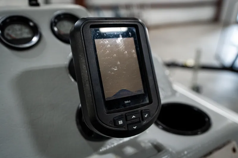 Slide: The Image of Close-up of a 1992 Harris FloteBote 240 Super Sunliner dashboard with a digital display. - 36