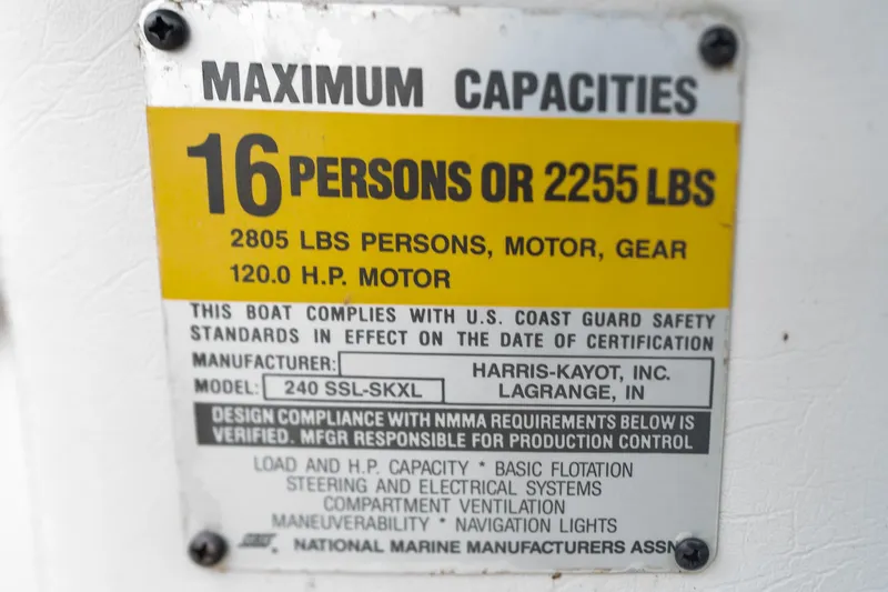 Slide: The Image of 1992 Harris FloteBote 240 Super Sunliner capacity label, 16 persons or 2255 lbs, safety compliance. - 46