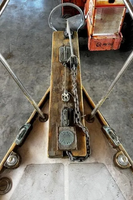 Slide: The Image of Bow of 1977 Cape Dory Sloop with anchor chain and deck fittings. - 14