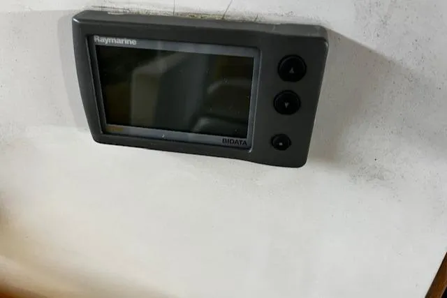 Slide: The Image of Raymarine display on 1977 Cape Dory Sloop, featuring navigation controls. - 7