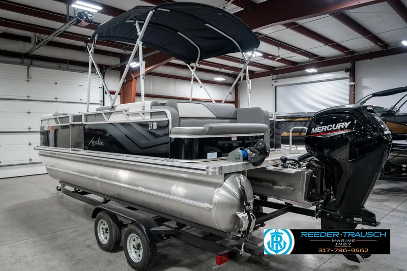 Slide: The Image of 2023 Avalon 2180 Vent CR pontoon boat with Mercury engine in a showroom. - 10