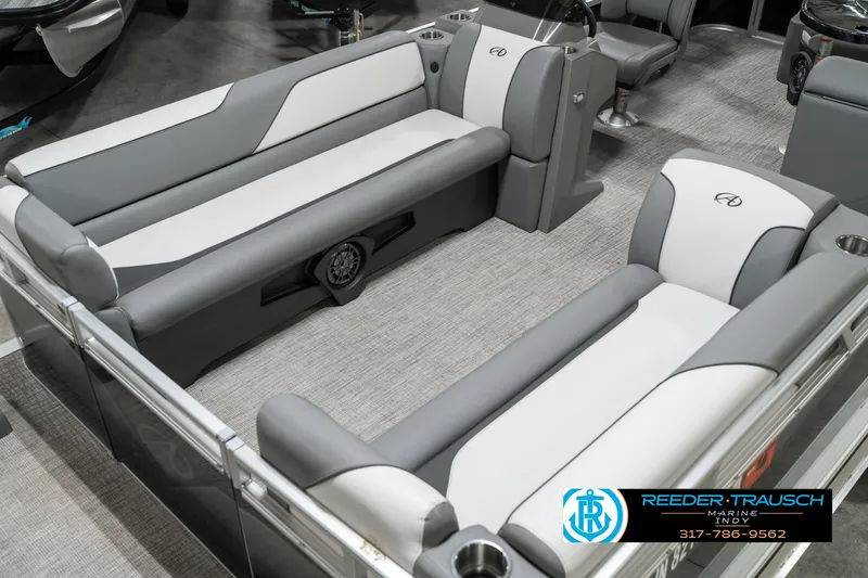 Slide: The Image of 2023 Avalon 2180 Vent CR boat interior with gray and white seating, modern design. - 12
