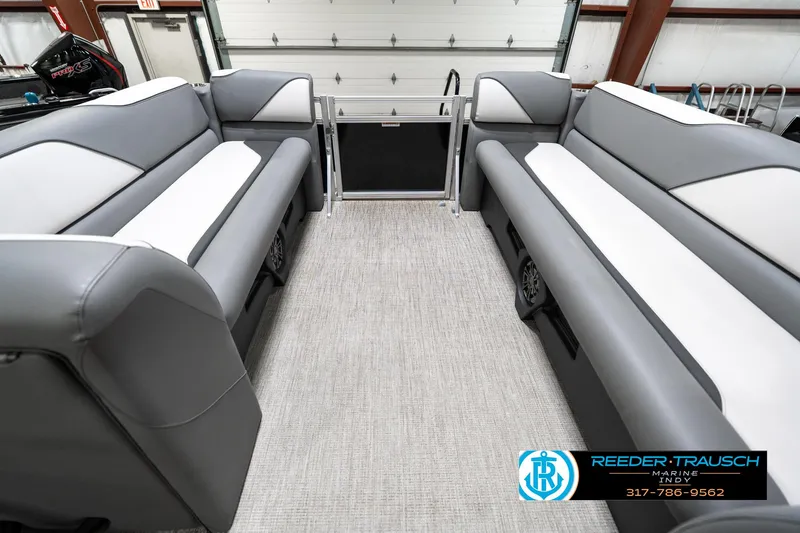 Slide: The Image of 2023 Avalon 2180 Vent CR pontoon boat interior with gray and white seating. - 21