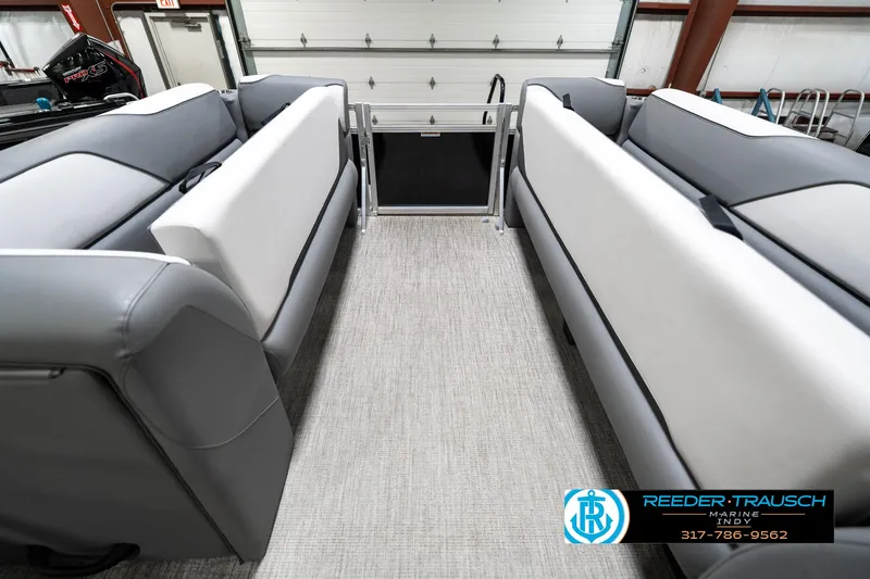 Slide: The Image of 2023 Avalon 2180 Vent CR interior with gray and white seating, displayed in a showroom. - 22