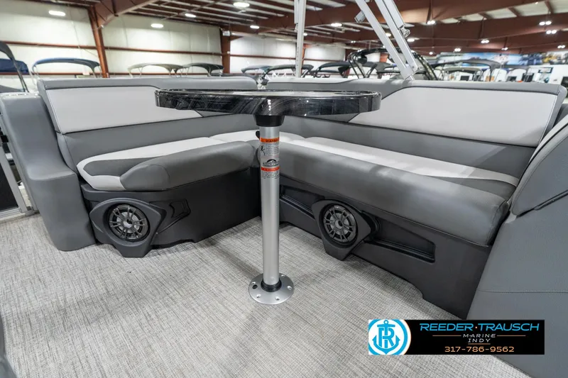 Slide: The Image of 2023 Avalon 2180 Vent CR boat interior with gray seating and table. - 25