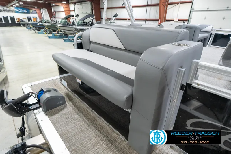 Slide: The Image of 2023 Avalon 2180 Vent CR boat interior with gray seating in showroom. - 29