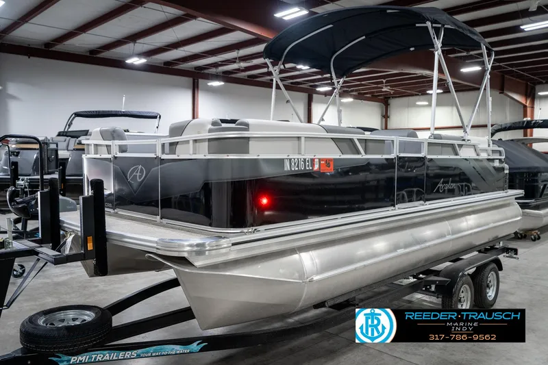 Slide: The Image of 2023 Avalon 2180 Vent CR pontoon boat on trailer in indoor showroom. - 3