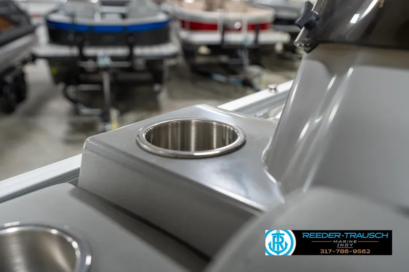 Slide: The Image of Close-up of 2023 Avalon 2180 Vent CR boat cup holder in showroom. - 43