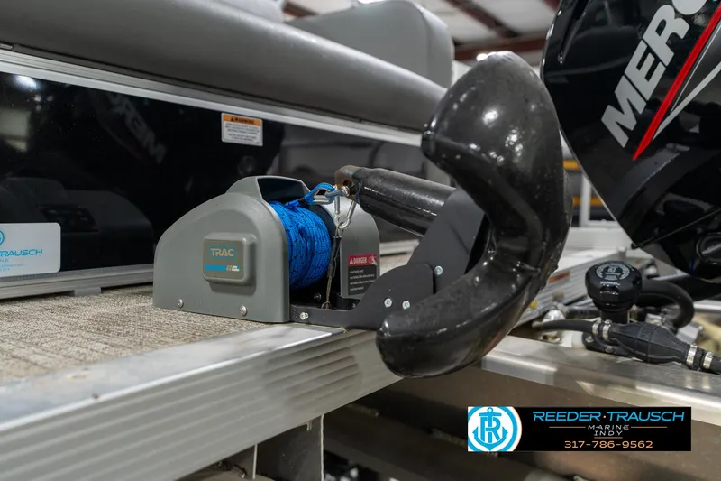 Slide: The Image of 2023 Avalon 2180 Vent CR boat with TRAC anchor winch and Mercury engine. - 46