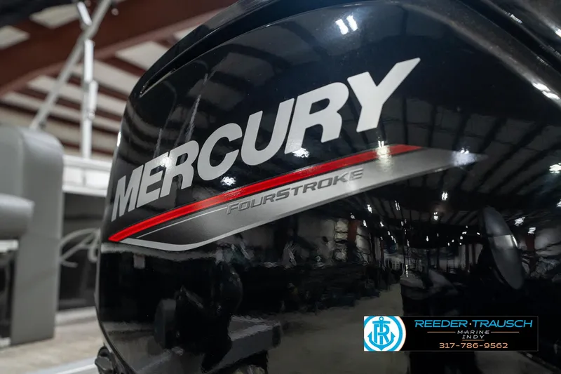 Slide: The Image of Mercury FourStroke engine on 2023 Avalon 2180 Vent CR boat at Reeder-Trausch Marine. - 48