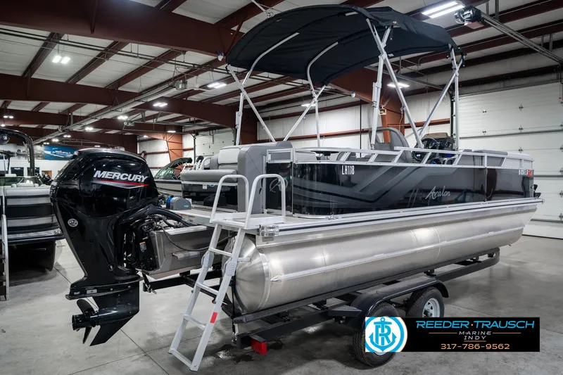 Slide: The Image of 2023 Avalon 2180 Vent CR pontoon boat with Mercury engine in a showroom. - 8