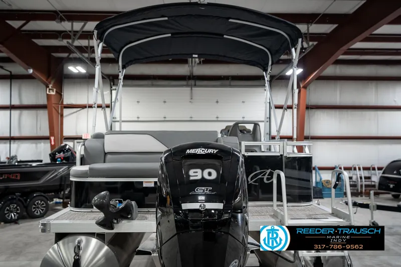 Slide: The Image of 2023 Avalon 2180 Vent CR pontoon boat with Mercury 90 engine in showroom. - 9