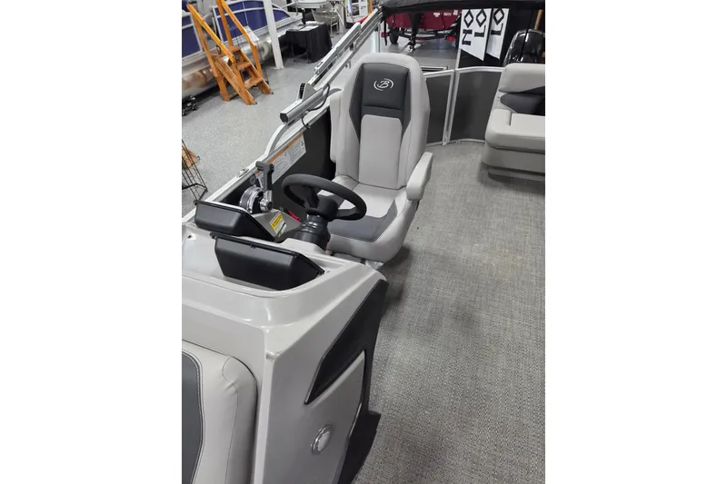 Slide: The Image of 2026 Barletta Aria A20L boat interior with steering wheel and seating. - 10