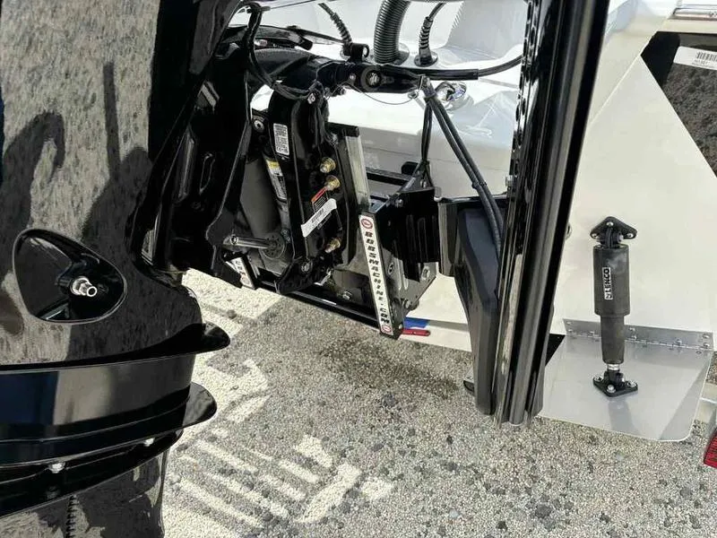 Slide: The Image of 2026 Blazer 2440 boat engine mount and hydraulic system close-up. - 11