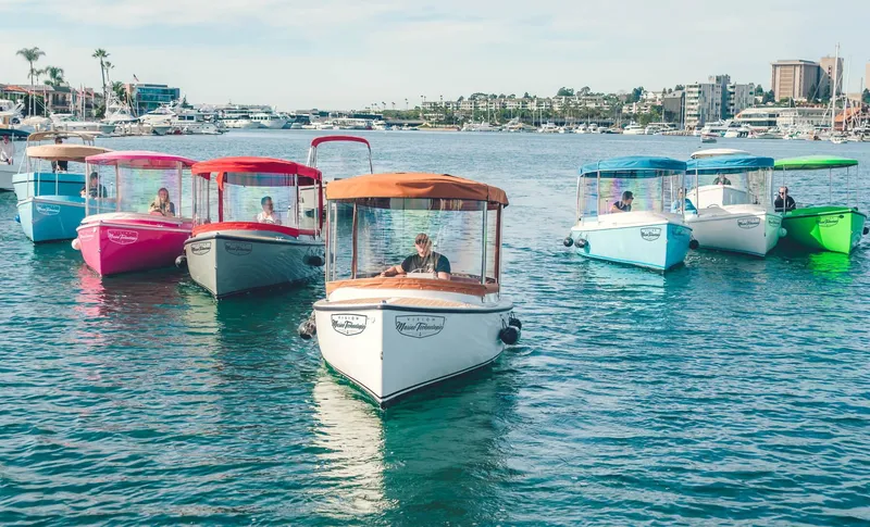 Slide: The Image of Colorful 2024 Vision Marine Technologies Fantail 217 boats on water, showcasing modern design. - 12