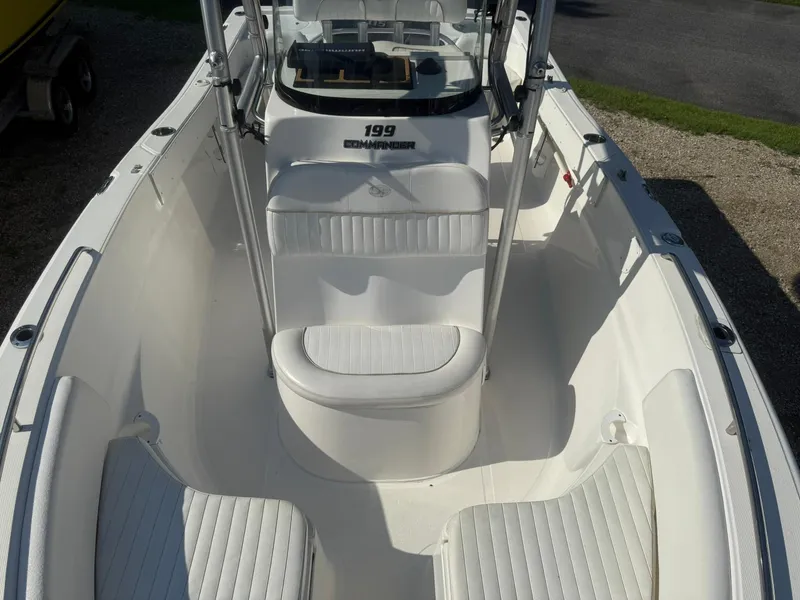Slide: The Image of 2014 Sea Fox 199 Commander boat interior with white seating and console. - 10