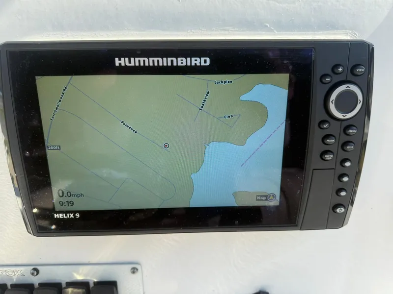 Slide: The Image of Humminbird Helix 9 GPS on 2014 Sea Fox 199 Commander boat dashboard. - 13