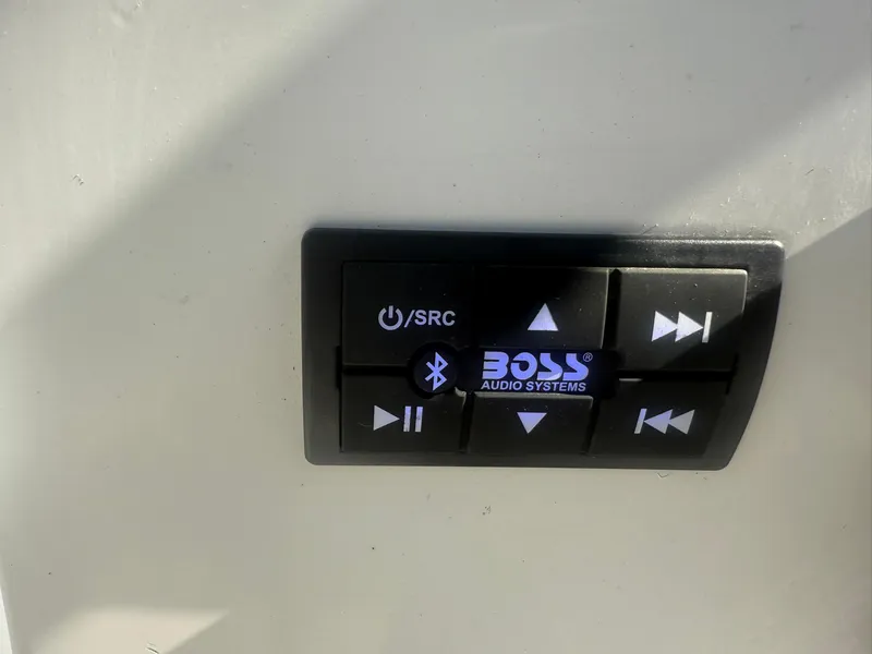Slide: The Image of Boss Audio Systems control panel on a 2014 Sea Fox 199 Commander boat. - 14