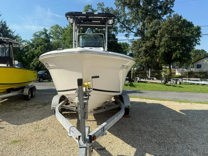 Slide: The Image of 2014 Sea Fox 199 Commander boat on trailer, parked outdoors. - 7