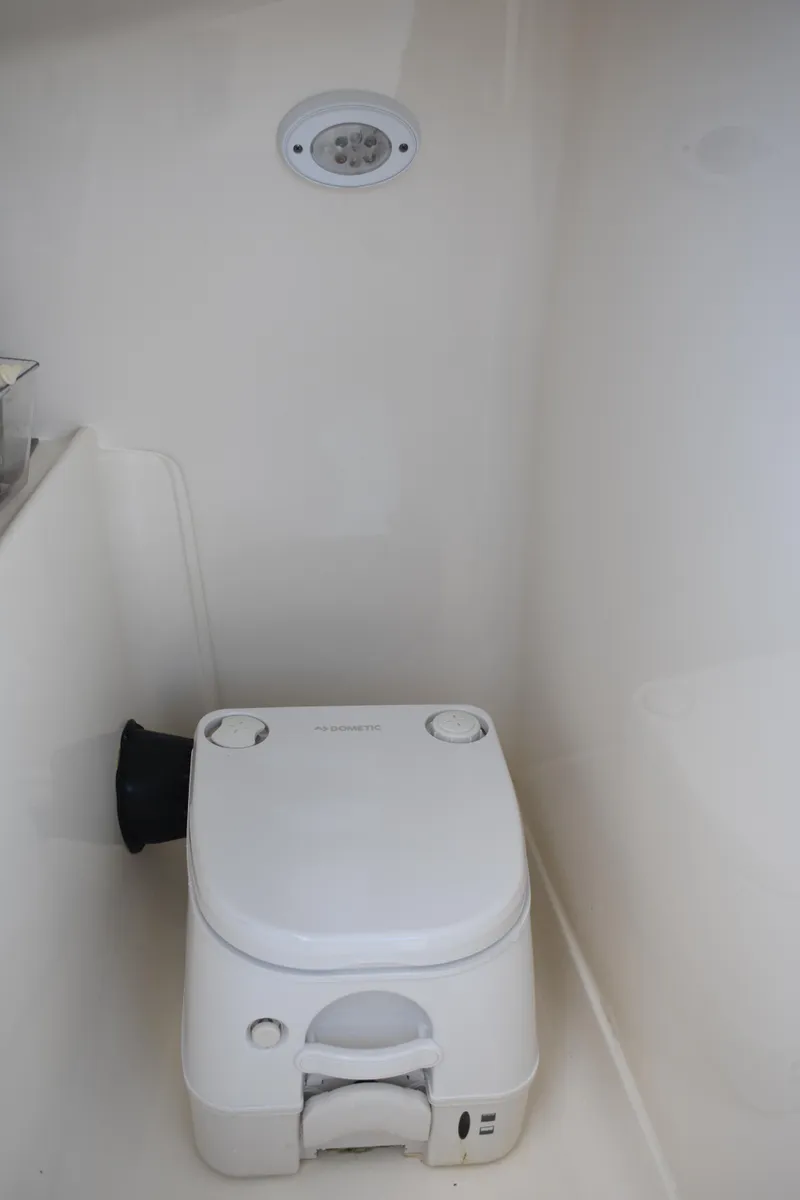 Slide: The Image of Portable toilet in 2019 Key West 239 DFS boat interior. - 13