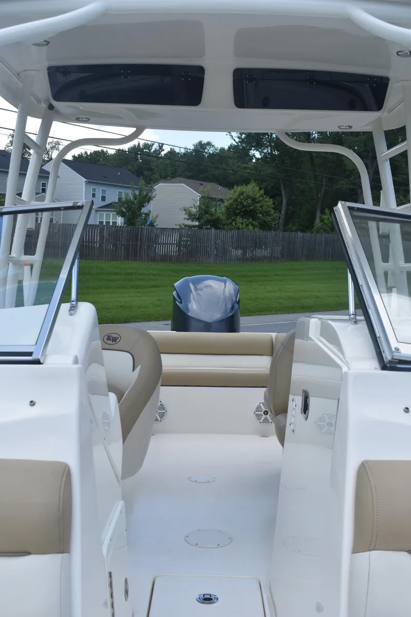 Slide: The Image of 2019 Key West 239 DFS boat interior with seating and outboard motor - 26
