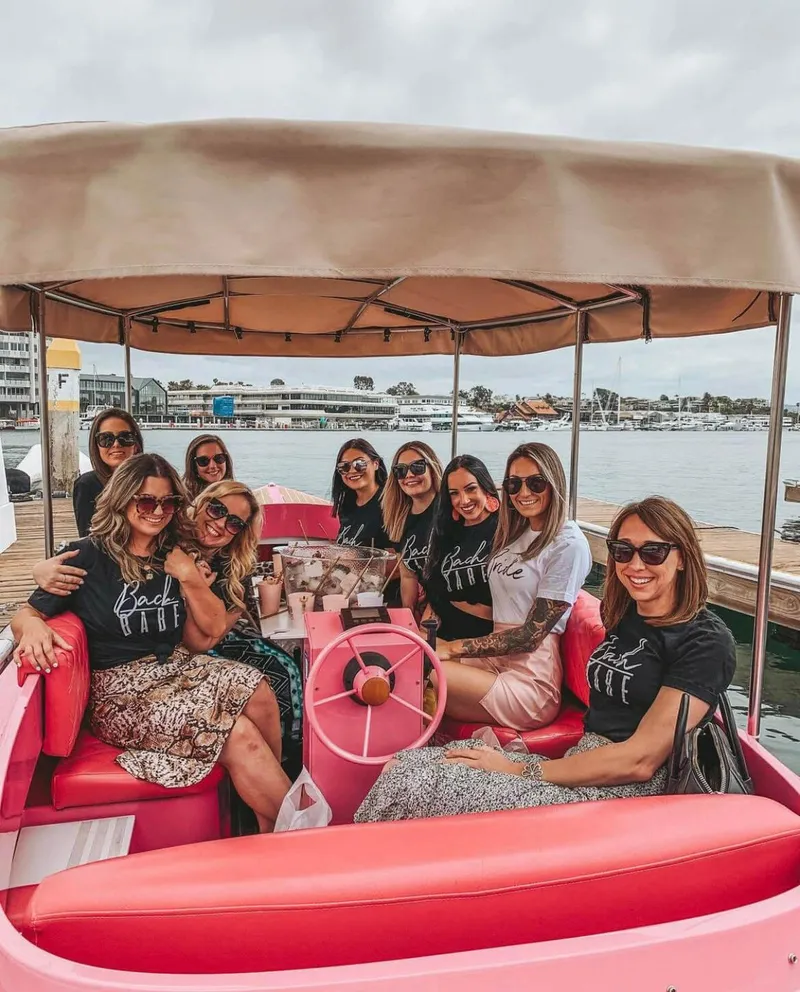 Slide: The Image of Group of women enjoying a ride on a 2024 Vision Marine Fantail 217 boat. - 11