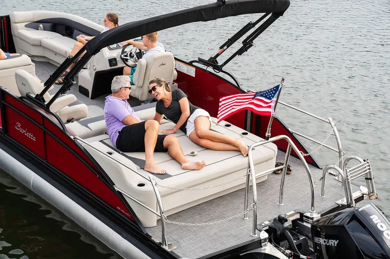 Slide: The Image of 2026 Barletta ARIA 22UC pontoon boat interior with gray seating and spacious layout. - 3