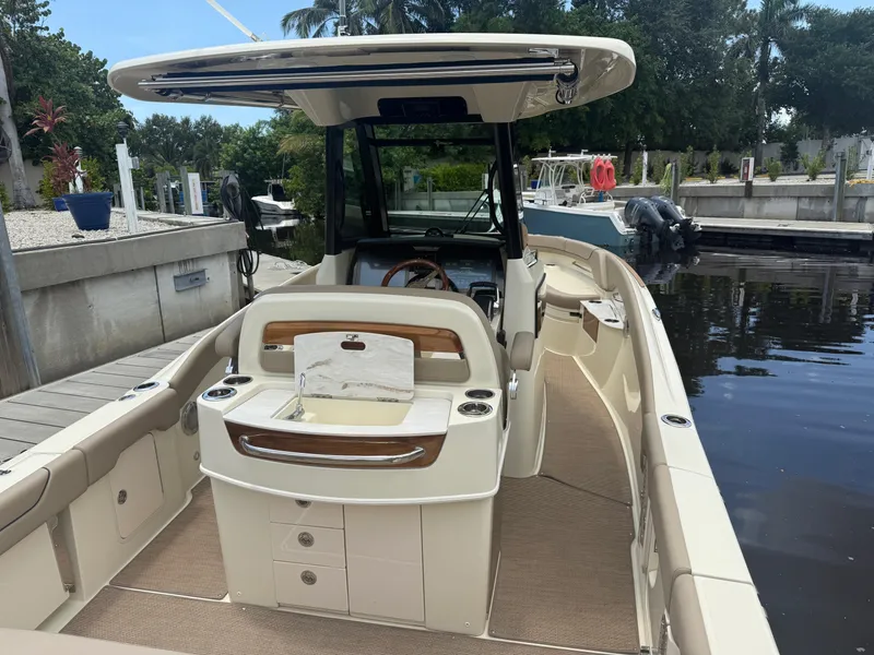 Slide: The Image of 2025 Chris-Craft Catalina 28 boat docked, featuring sleek design and modern amenities. - 13