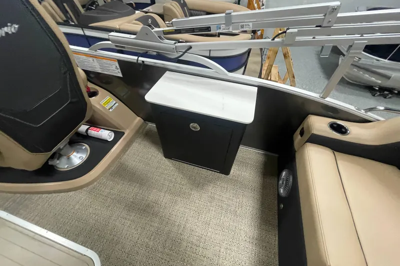 Slide: The Image of 2026 Barletta Cabrio 24UE interior with seating and storage cabinet. - 9
