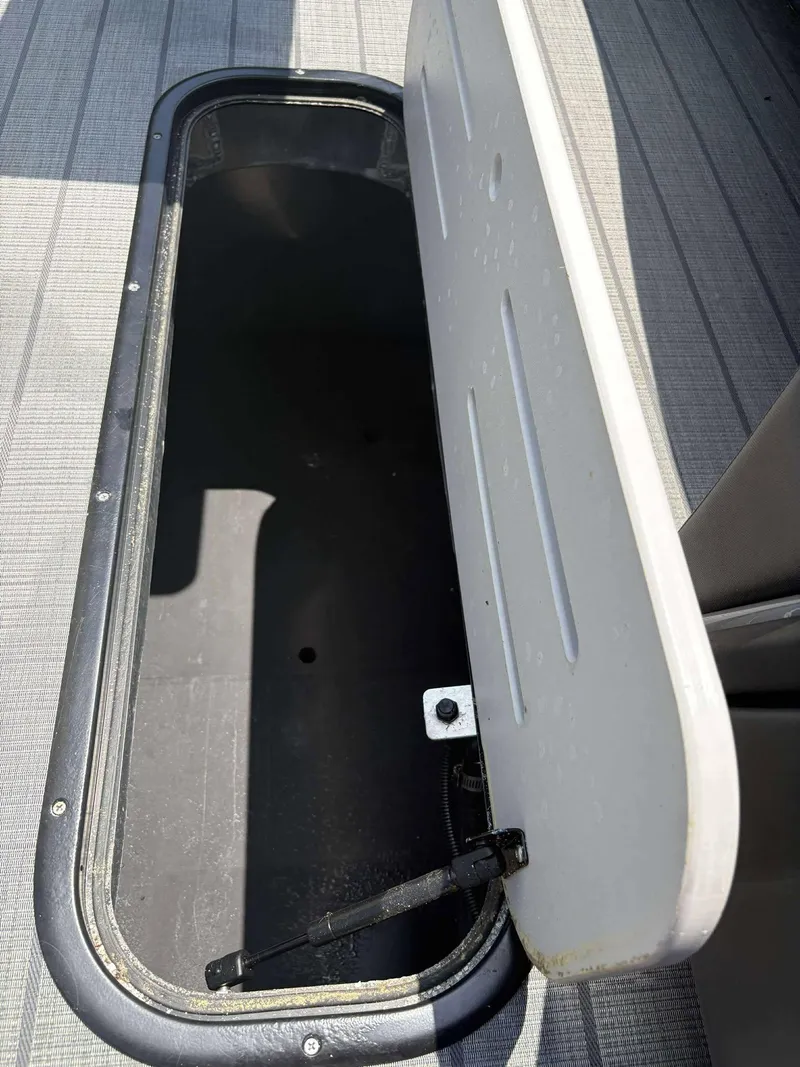 Slide: The Image of Open storage compartment on 2023 Veranda V25RCT boat deck. - 17