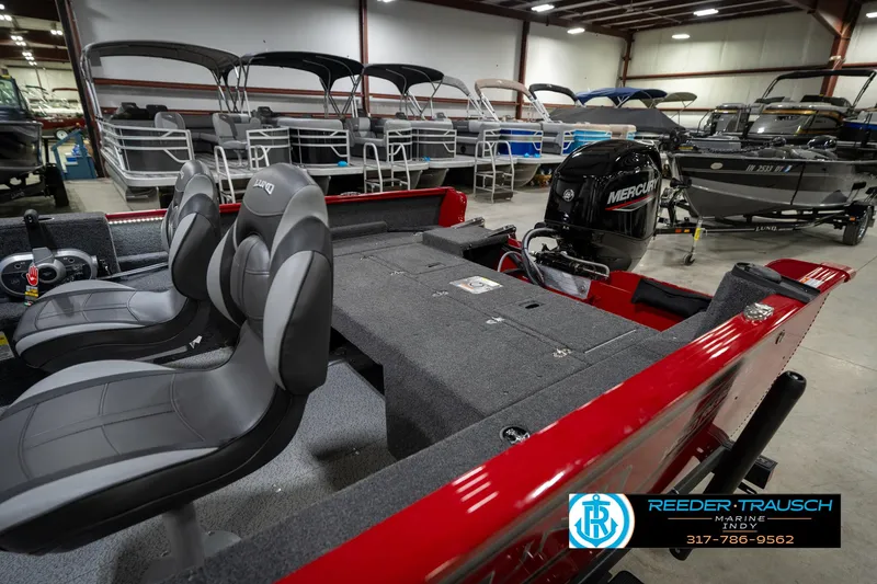 Slide: The Image of 2026 Lund 1650 Rebel XL SS boat with Mercury engine in showroom. - 27